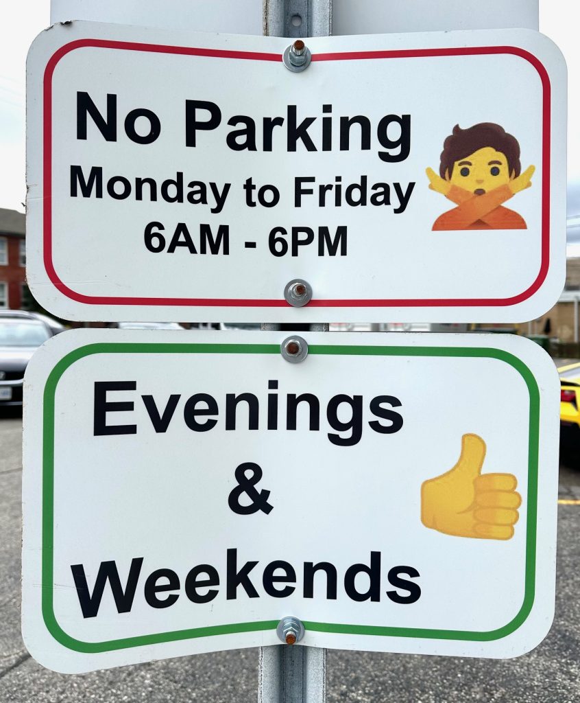 parking signs with words and emoji