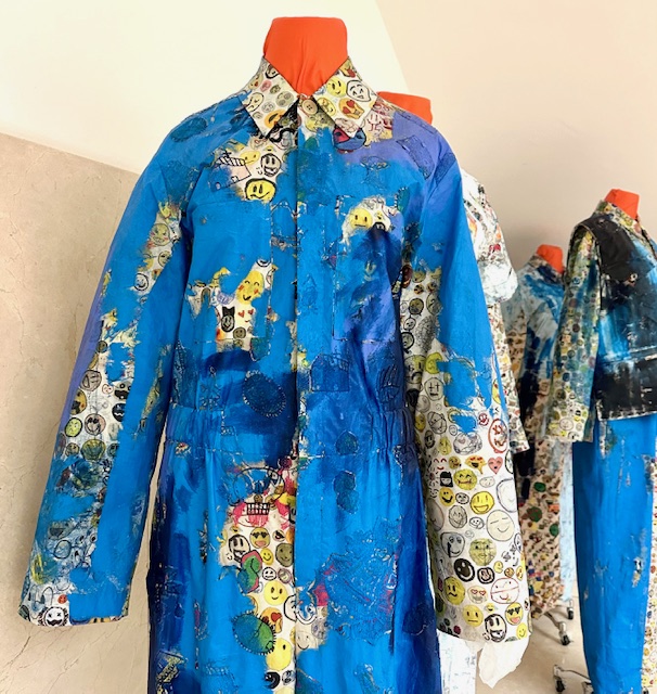 shirt painted and printed with emoji all over it